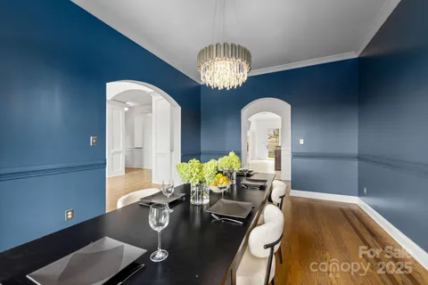 a living room with furniture fireplace and flat screen tv