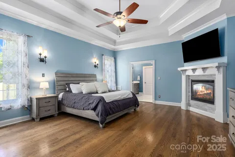 a view of a livingroom with furniture and a window
