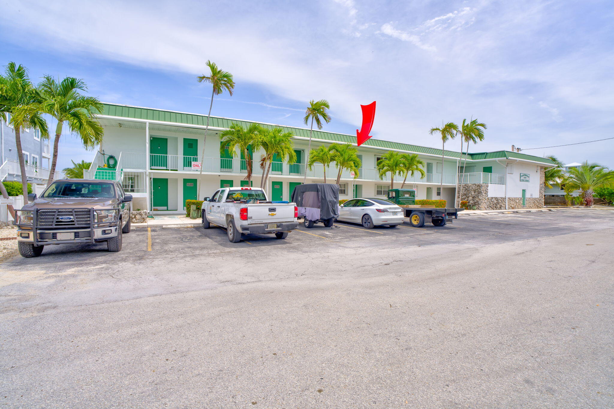 5301 Ocean Terrace, Unit 6 Marathon, FL 33050 - Photo 12 of 38 a car parked in front of building