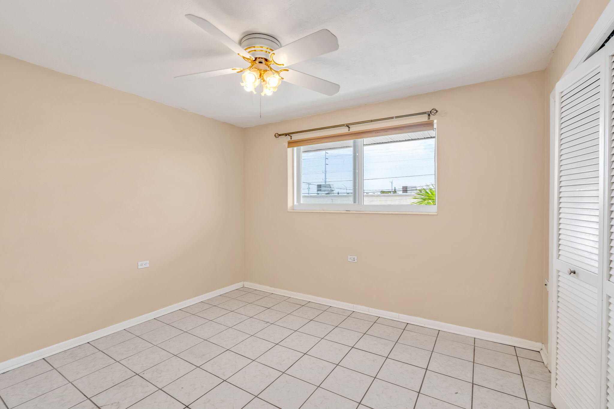 5301 Ocean Terrace, Unit 6 Marathon, FL 33050 - Photo 25 of 38 a view of an empty room with a window