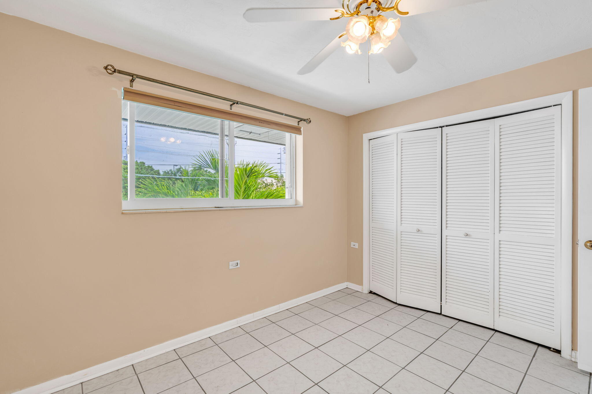 5301 Ocean Terrace, Unit 6 Marathon, FL 33050 - Photo 26 of 38 a view of an empty room with a window