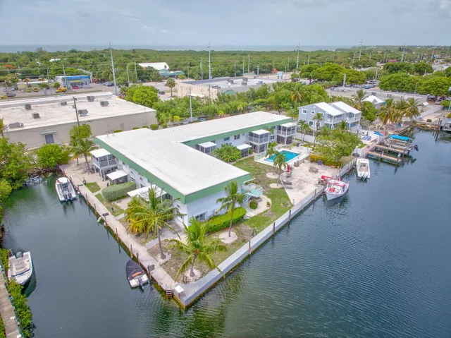 a aerial view of a house with outdoor space