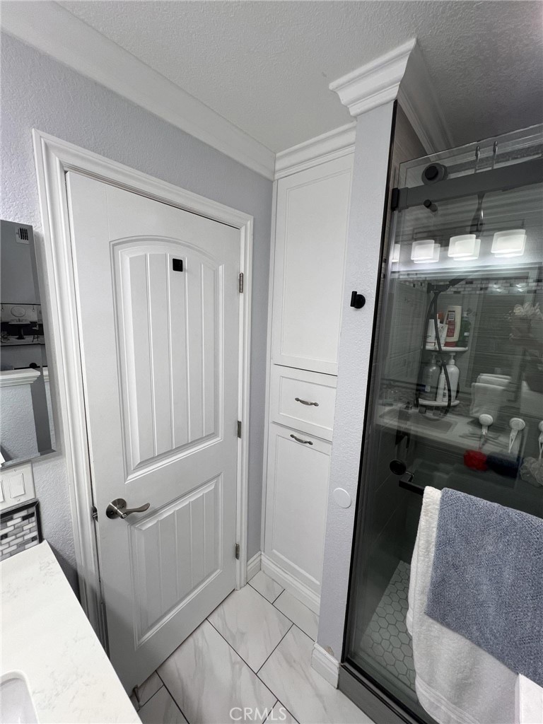 591 North Smoke Tree Avenue Rialto, CA 92376 - Photo 22 of 48 a view of a hallway