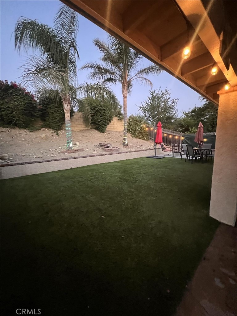 591 North Smoke Tree Avenue Rialto, CA 92376 - Photo 40 of 48 a front view of a house with garden