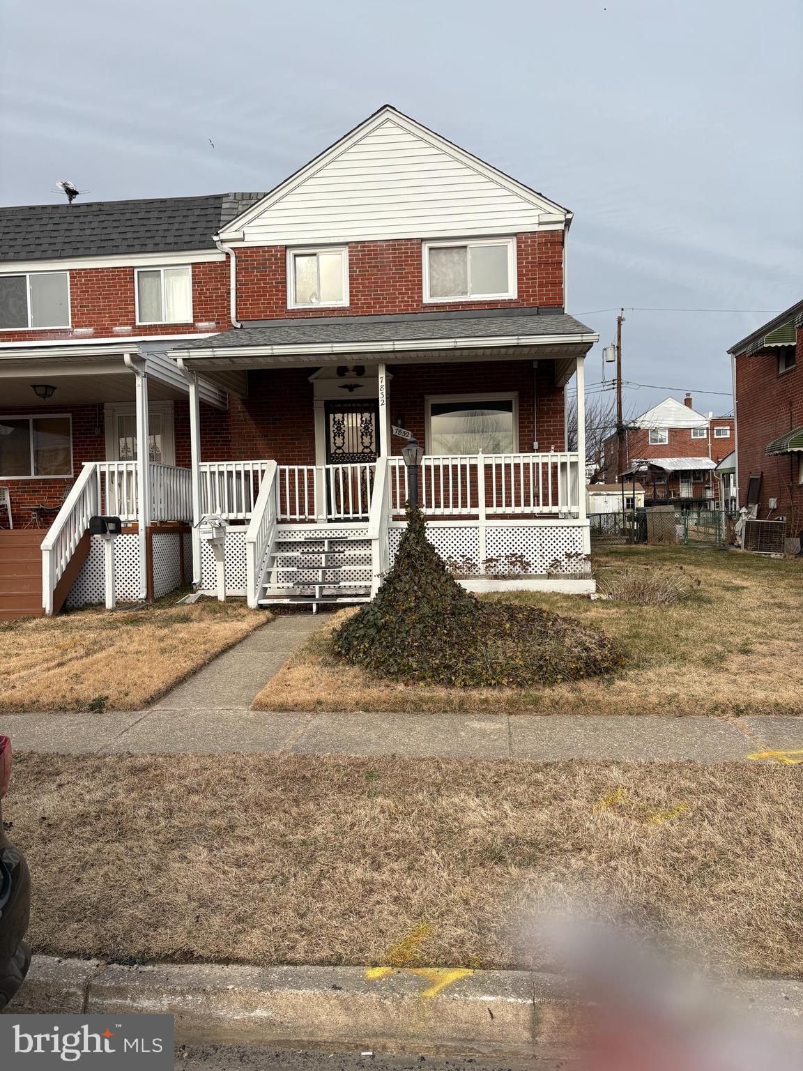 7832 Rockbourne Road Baltimore, MD 21222 - Photo 2 of 20 a view of a house with a yard
