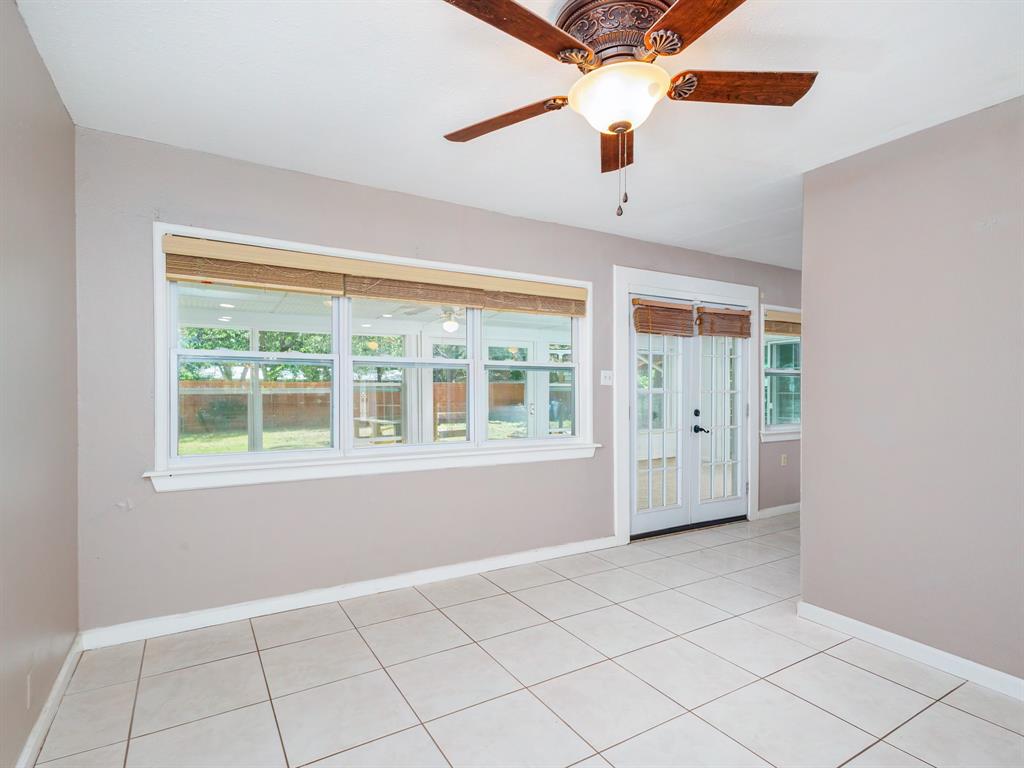 4002 Austin Avenue Brownwood, TX 76801 - Photo 9 of 34 a view of an empty room with a window