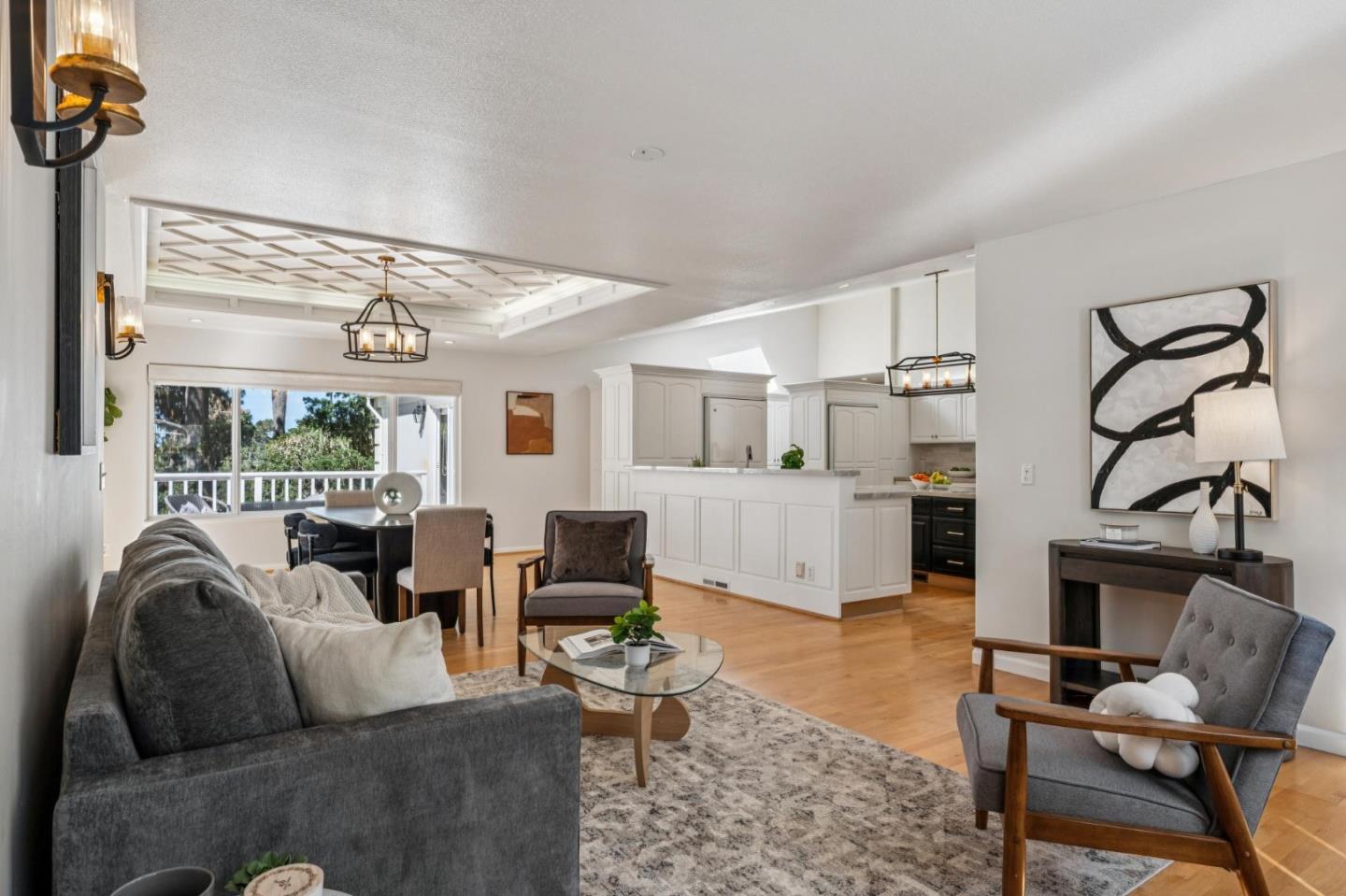 2905 Bird Rock Road Pebble Beach, CA 93953 - Photo 12 of 33 a living room with furniture a rug and white walls