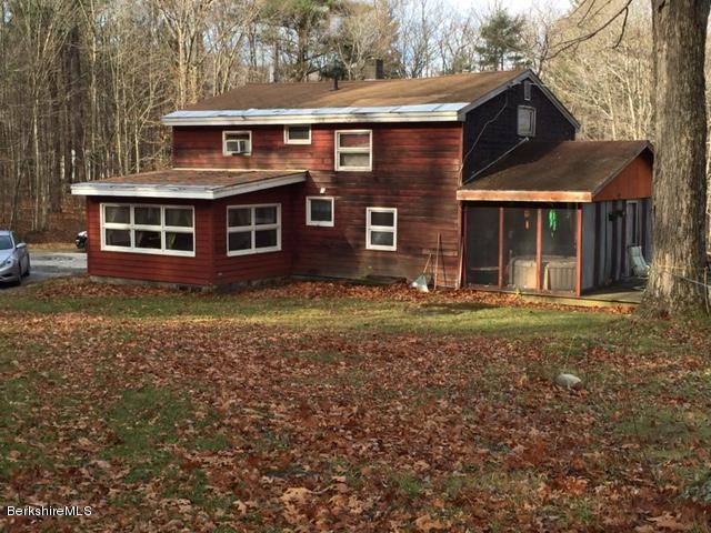 180 West Shaft Road North Adams, MA 01247 - Photo 1 of 5 a view of a brick house with a yard