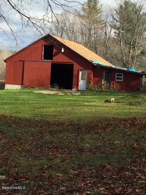 180 West Shaft Road North Adams, MA 01247 - Photo 2 of 5 a front view of a house with garden