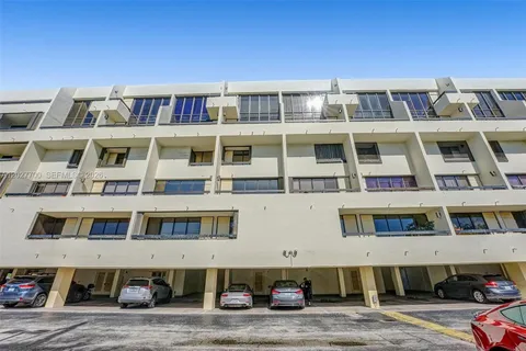 a front view of a building with windows