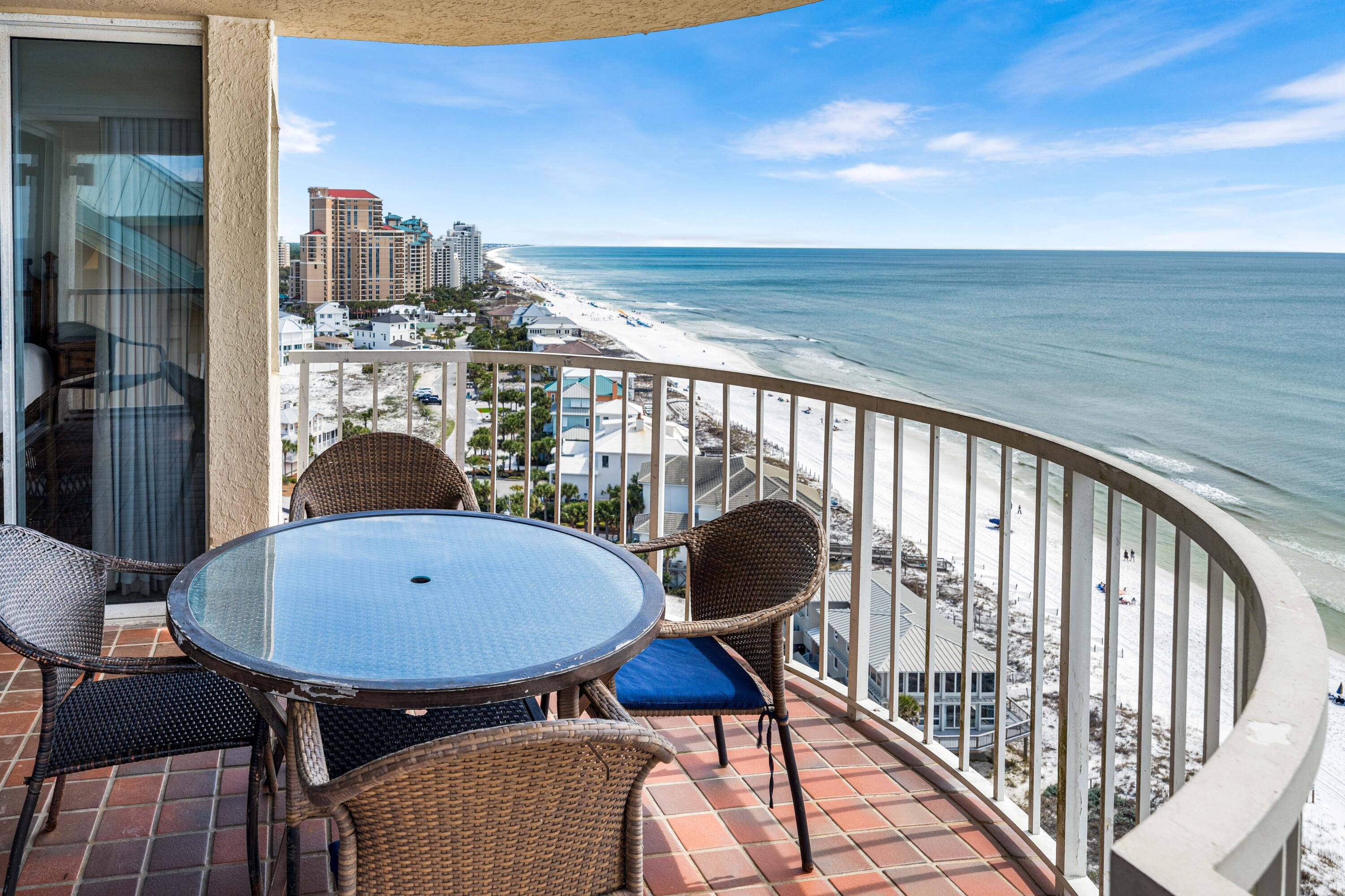 9815 Highway 98, Unit A1506 Miramar Beach, FL 32550 - Photo 28 of 44 a balcony with table and chairs