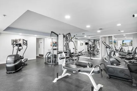 a view of a room with gym equipment