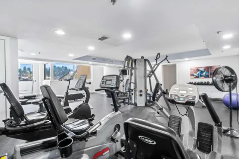 a view of a room with gym equipment
