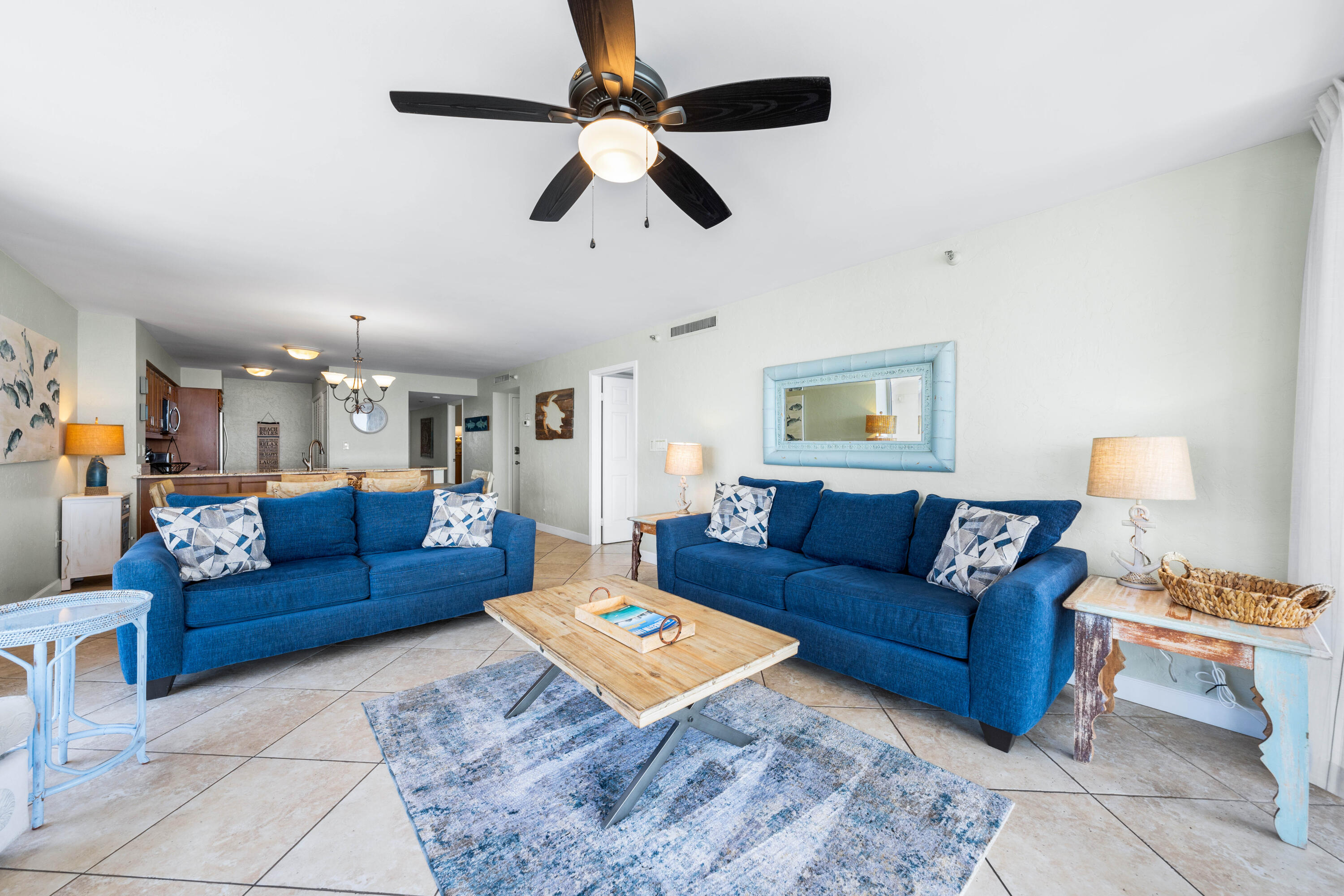 9815 Highway 98, Unit A1506 Miramar Beach, FL 32550 - Photo 8 of 44 a living room with furniture and a rug