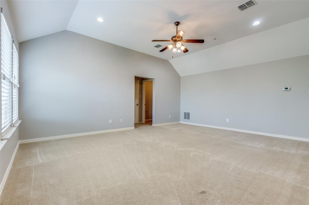 131 North Ridge Trail Prosper, TX 75078 - Photo 22 of 25 a view of an empty room with chandelier fan and window