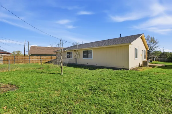 a house view with a backyard space