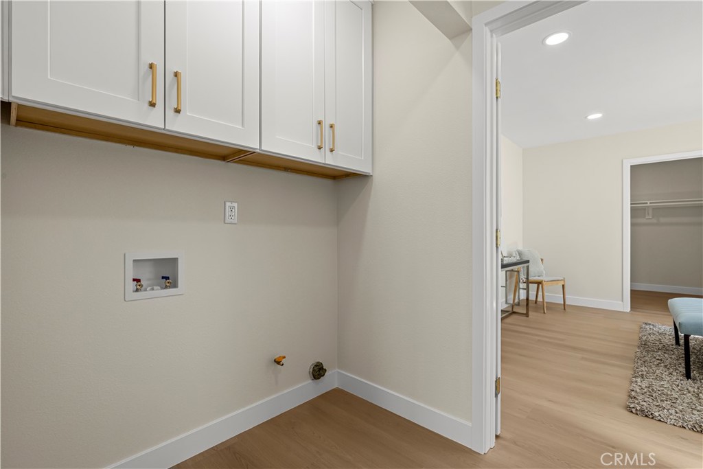 16931 Rinaldi Street Granada Hills, CA 91344 - Photo 20 of 46 a view of kitchen with furniture and wooden floor