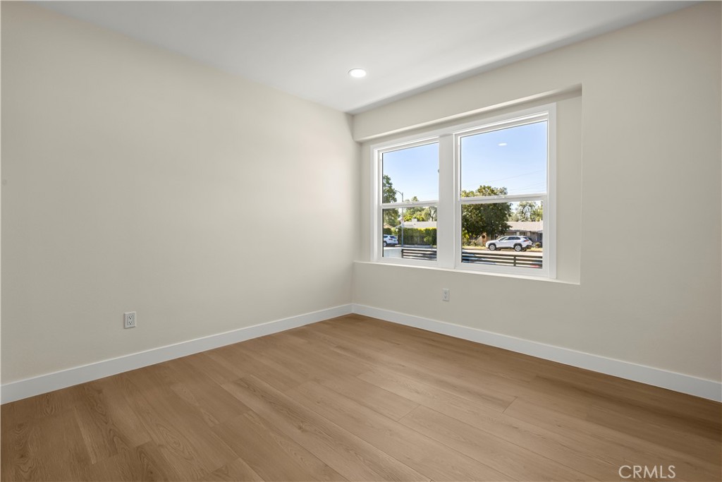 16931 Rinaldi Street Granada Hills, CA 91344 - Photo 22 of 46 an empty room with windows