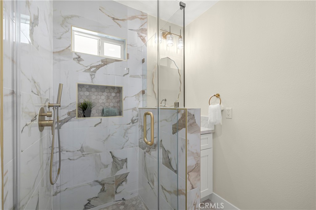 16931 Rinaldi Street Granada Hills, CA 91344 - Photo 27 of 46 a bathroom with a shower