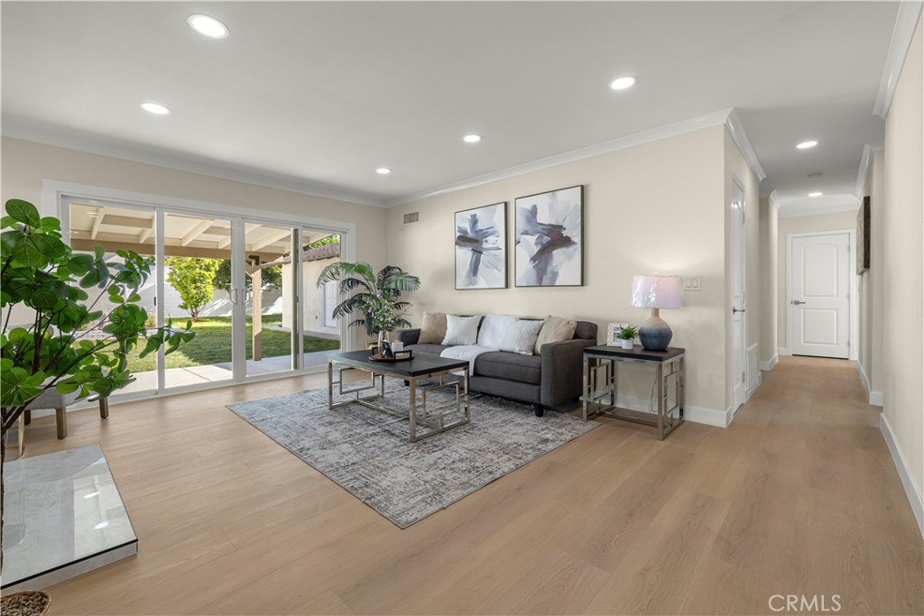 16931 Rinaldi Street Granada Hills, CA 91344 - Photo 10 of 46 a living room with furniture and a potted plant