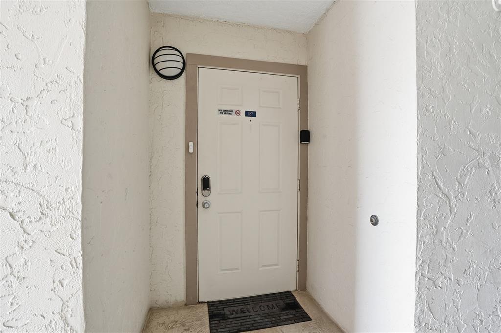 3170 Matecumbe Key Road, Unit 127 Punta Gorda, FL 33955 - Photo 2 of 22 a bathroom with a sink