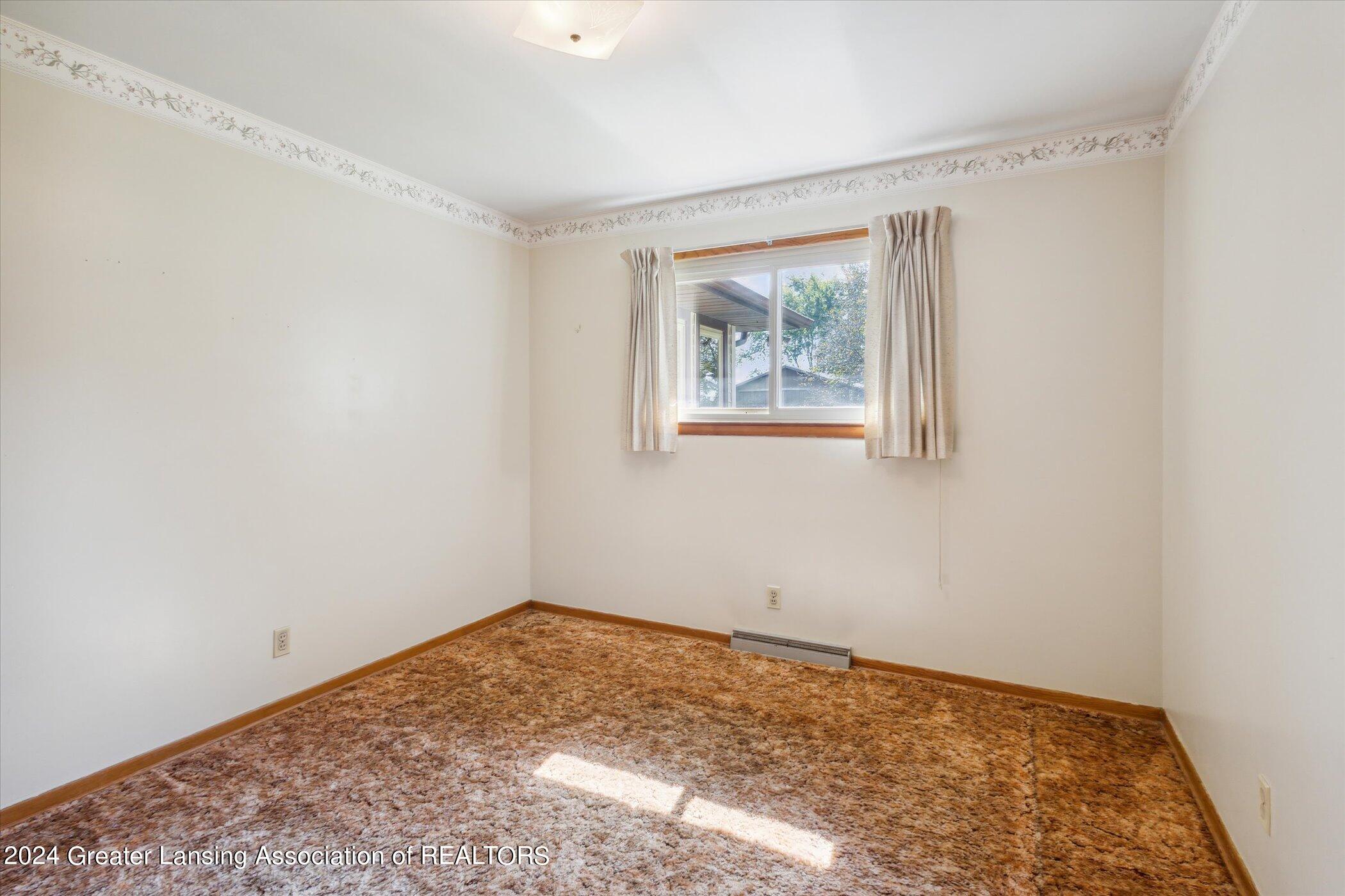 7041 West Howe Road Dewitt, MI 48820 - Photo 23 of 47 25-7041-W-Howe-Rd-DeWitt-MI-48820-Window
