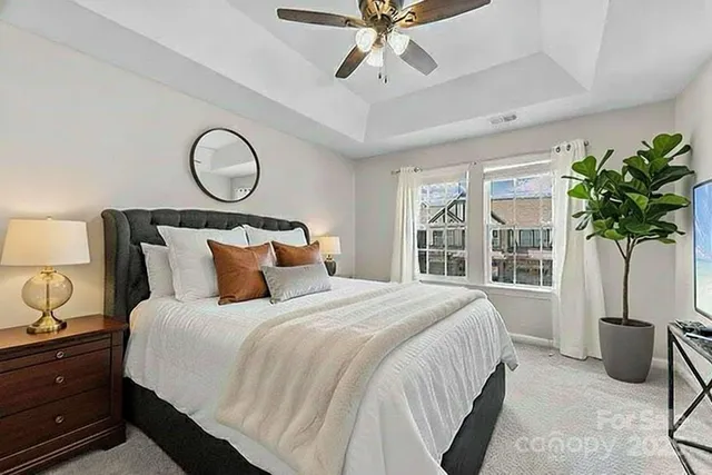 an aerial view of multiple houses with yard