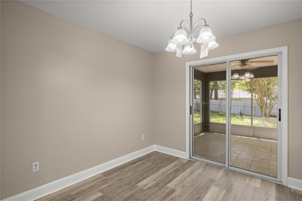 46 Teak Run Ocala, FL 34472 - Photo 11 of 26 wooden floor in an empty room