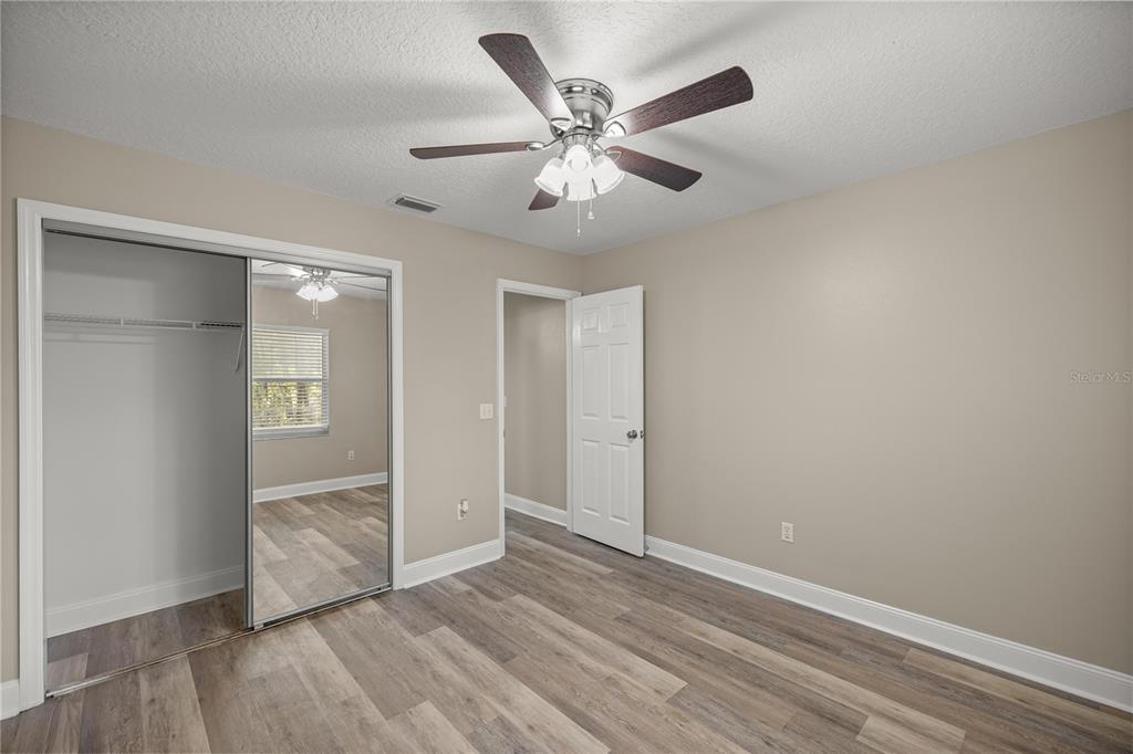 46 Teak Run Ocala, FL 34472 - Photo 16 of 26 wooden floor in an empty room