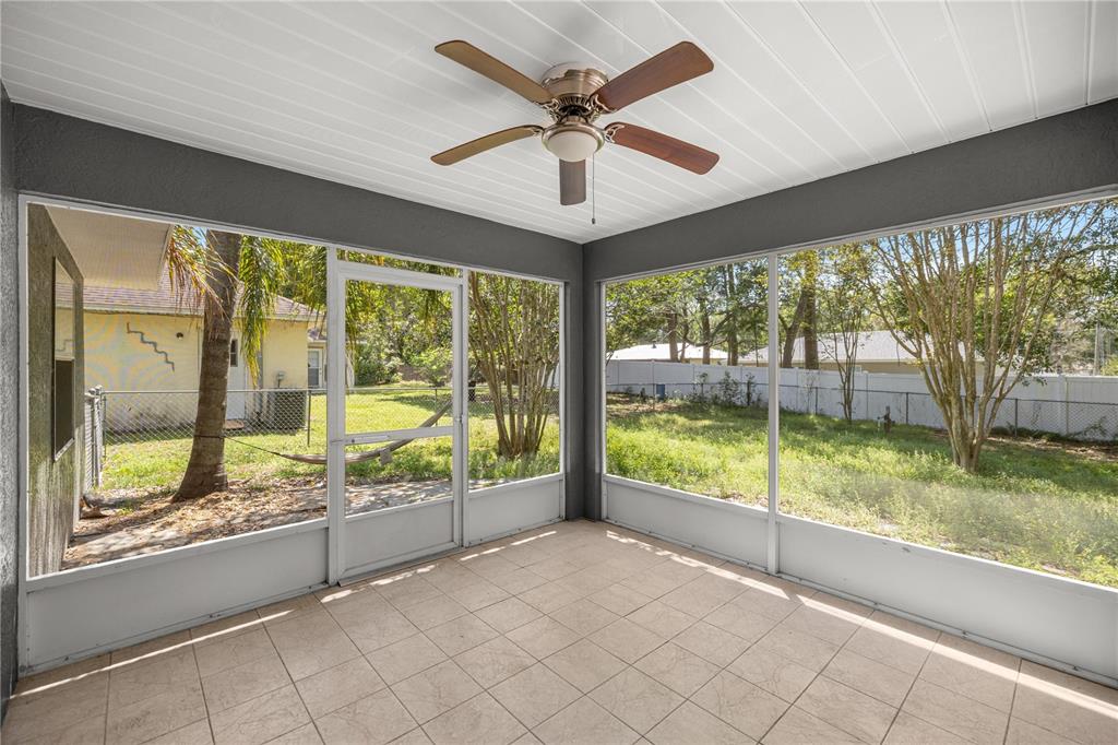 46 Teak Run Ocala, FL 34472 - Photo 19 of 26 wooden floor in an empty room with a large window