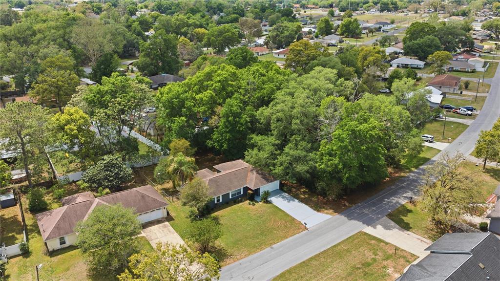 46 Teak Run Ocala, FL 34472 - Photo 24 of 26 an aerial view of residential house with outdoor space and trees all around