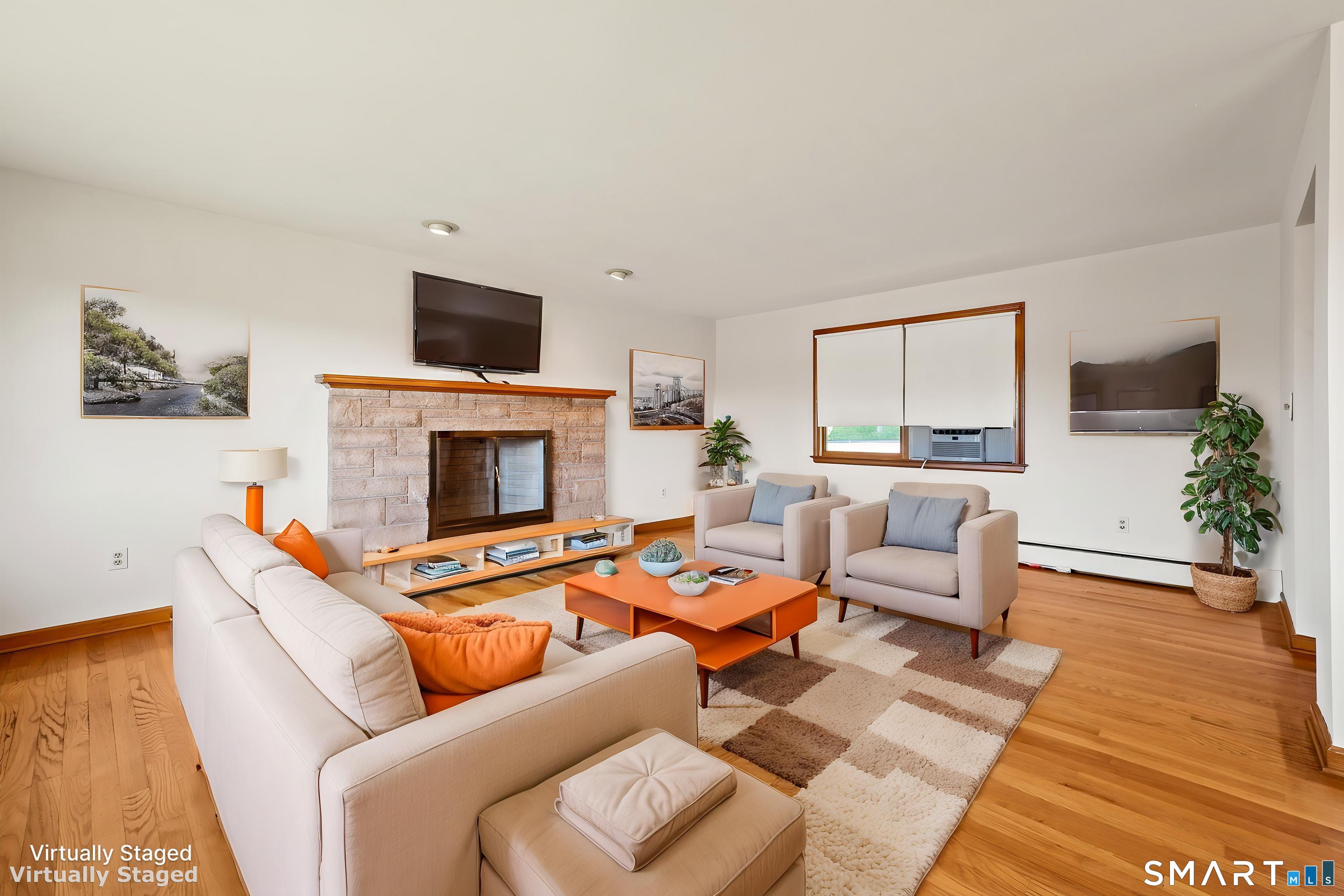 31 Grandview Terrace Portland, CT 06480 - Photo 13 of 40 a living room with furniture and a fireplace