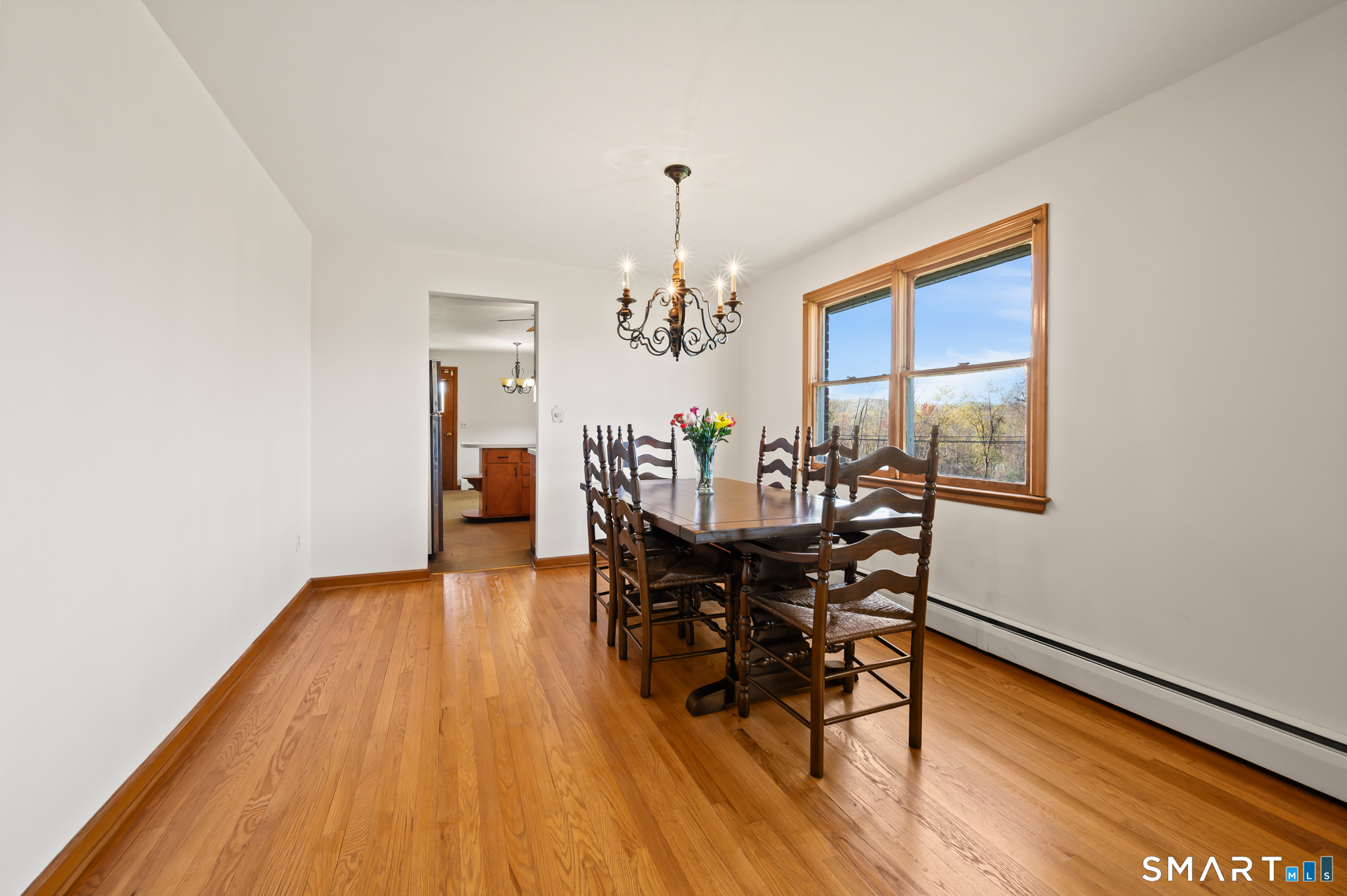 31 Grandview Terrace Portland, CT 06480 - Photo 16 of 40 a view of a dining room with furniture and chandelier
