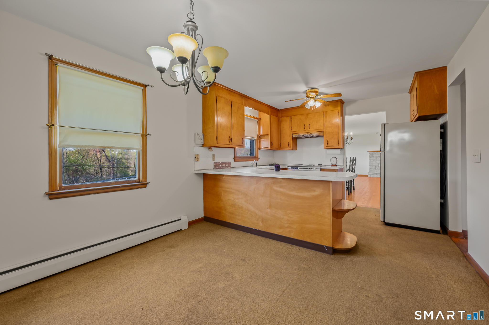31 Grandview Terrace Portland, CT 06480 - Photo 22 of 40 a view of kitchen with stainless steel appliances granite countertop cabinets and a chandelier