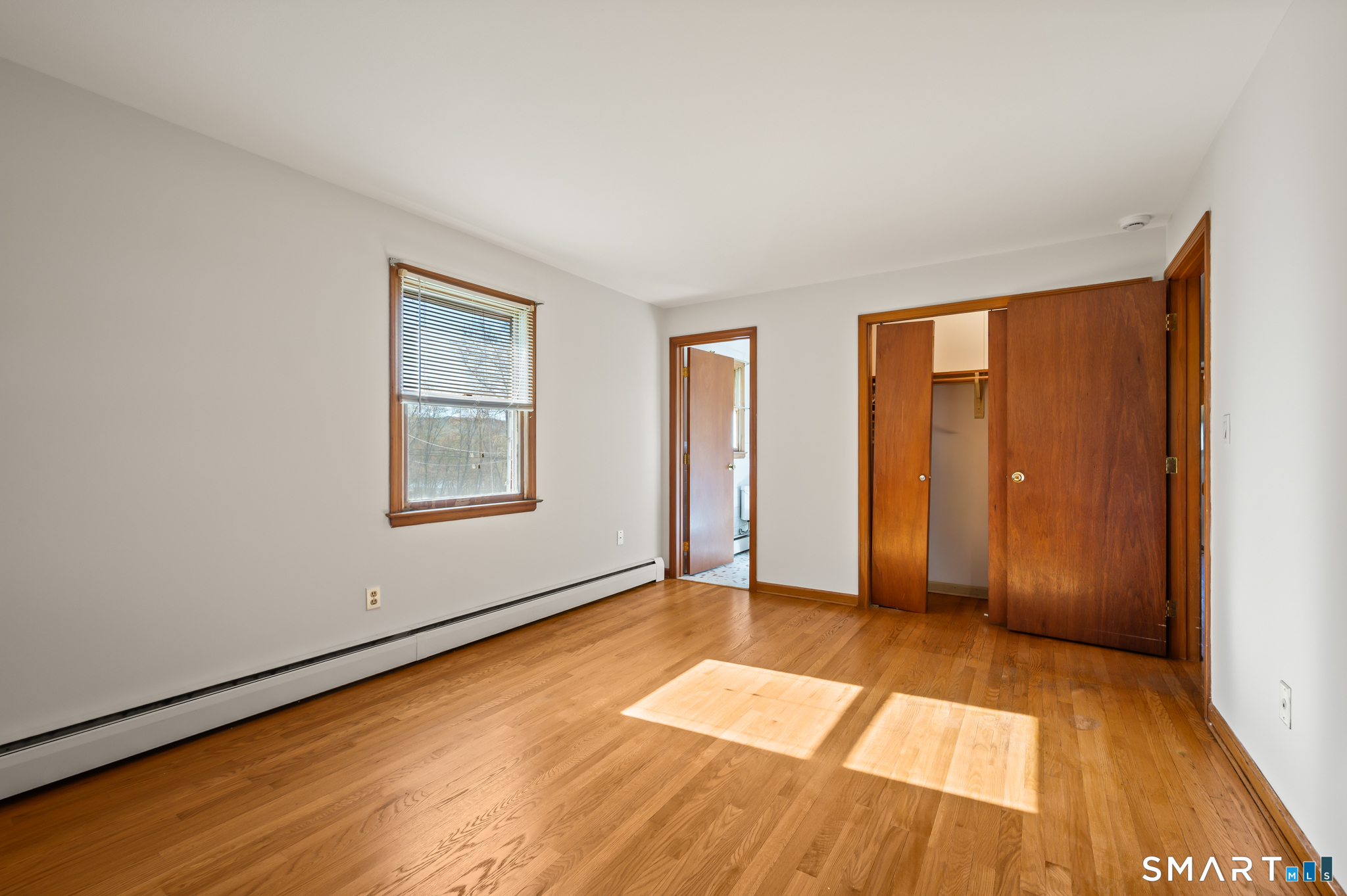 31 Grandview Terrace Portland, CT 06480 - Photo 25 of 40 a view of an empty room with window and bathroom