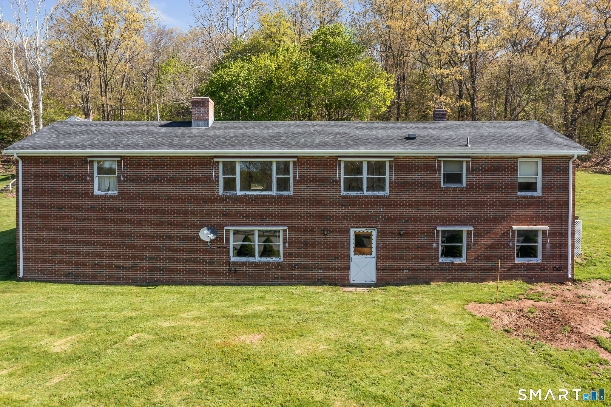 31 Grandview Terrace Portland, CT 06480 - Photo 3 of 40 a front view of a house with a yard