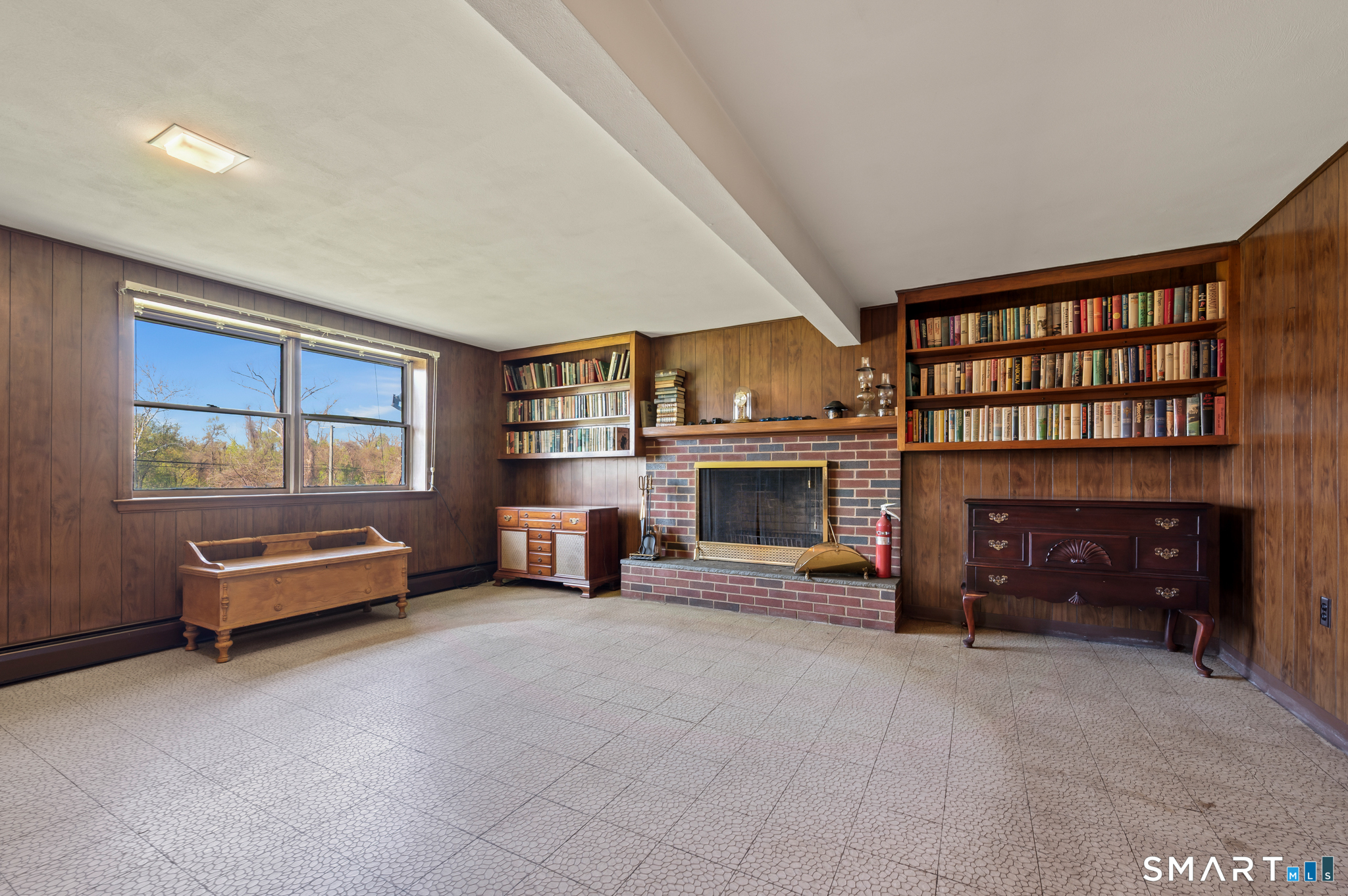 31 Grandview Terrace Portland, CT 06480 - Photo 34 of 40 a living room with furniture and a fireplace