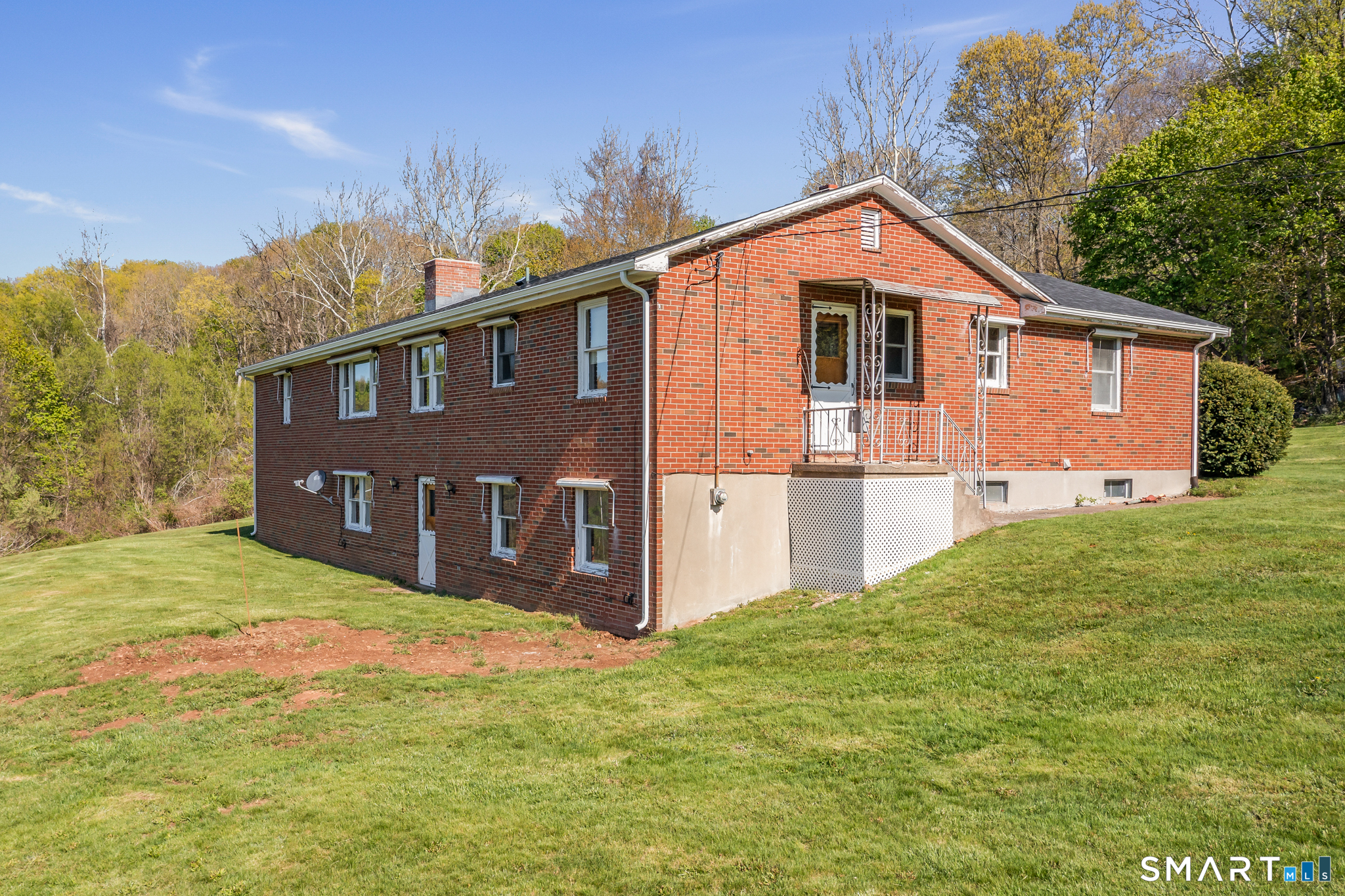 31 Grandview Terrace Portland, CT 06480 - Photo 5 of 40 a front view of a house with a yard