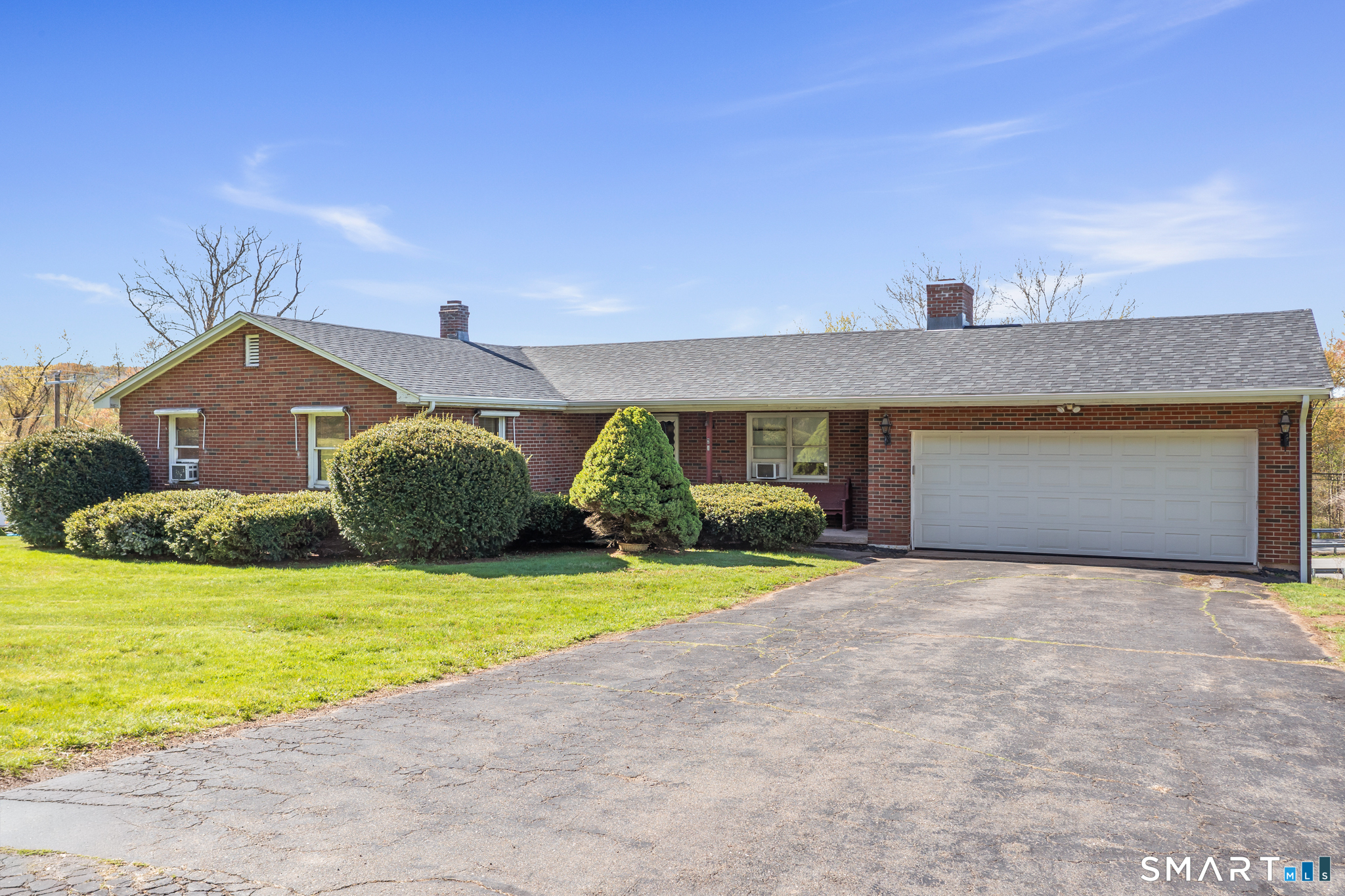 31 Grandview Terrace Portland, CT 06480 - Photo 6 of 40 a view of a house with a yard and garage