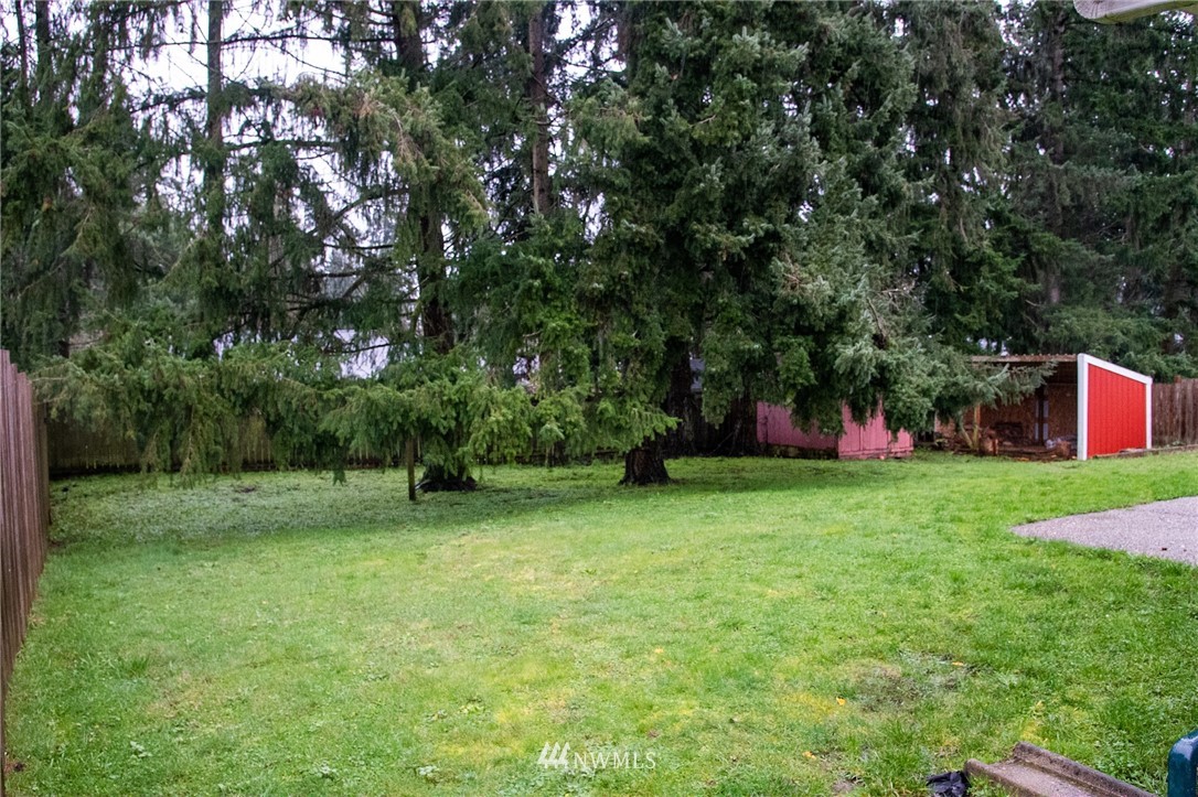 8723 Hawks Glen Loop Southeast Olympia, WA 98513 - Photo 11 of 12 a view of outdoor space with a garden and entertaining space
