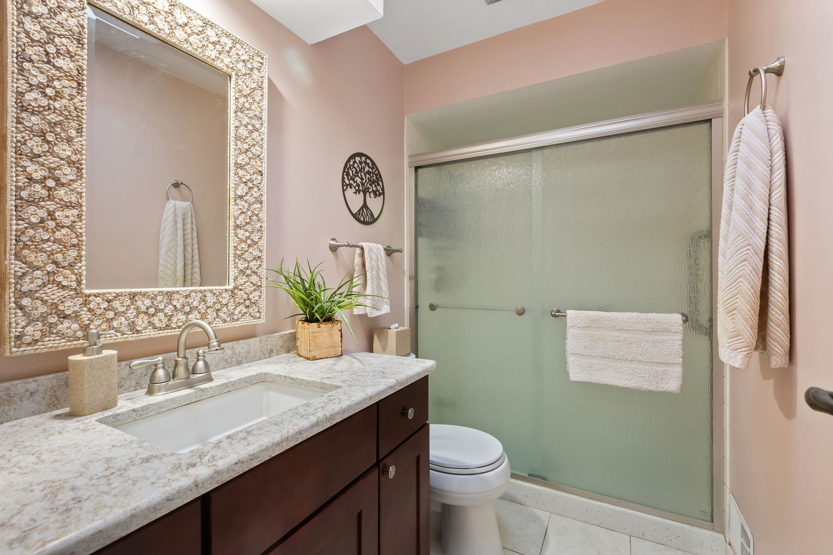2425 El Cid Lane Northbrook, IL 60062 - Photo 20 of 28 a bathroom with a granite countertop sink a toilet and a mirror