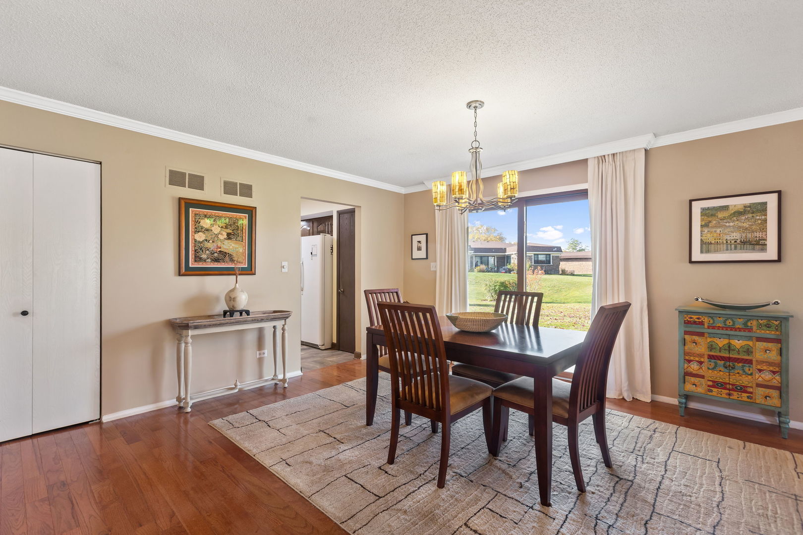 2425 El Cid Lane Northbrook, IL 60062 - Photo 7 of 28 a view of a dining room with furniture window and wooden floor