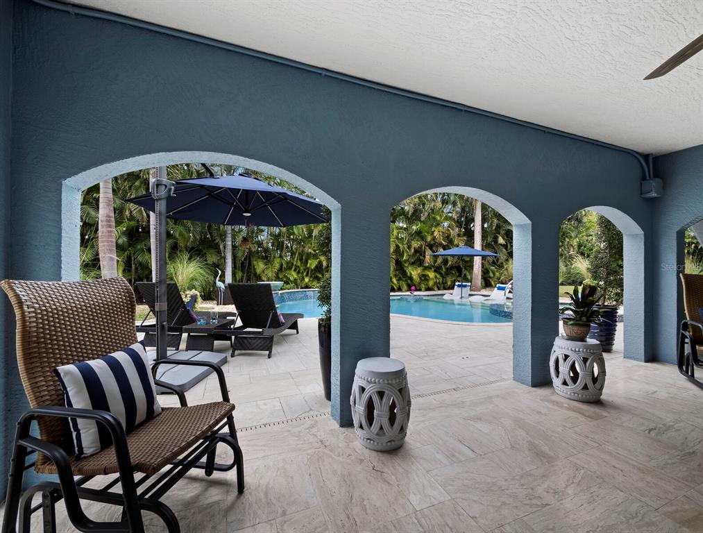 651 Broadway Street Longboat Key, FL 34228 - Photo 37 of 75 a view of hall way with furniture and floor to ceiling window