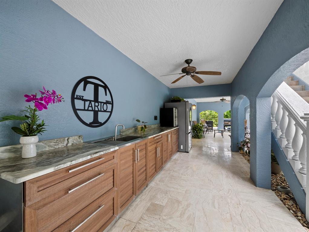 651 Broadway Street Longboat Key, FL 34228 - Photo 41 of 75 a view of living room and kitchen