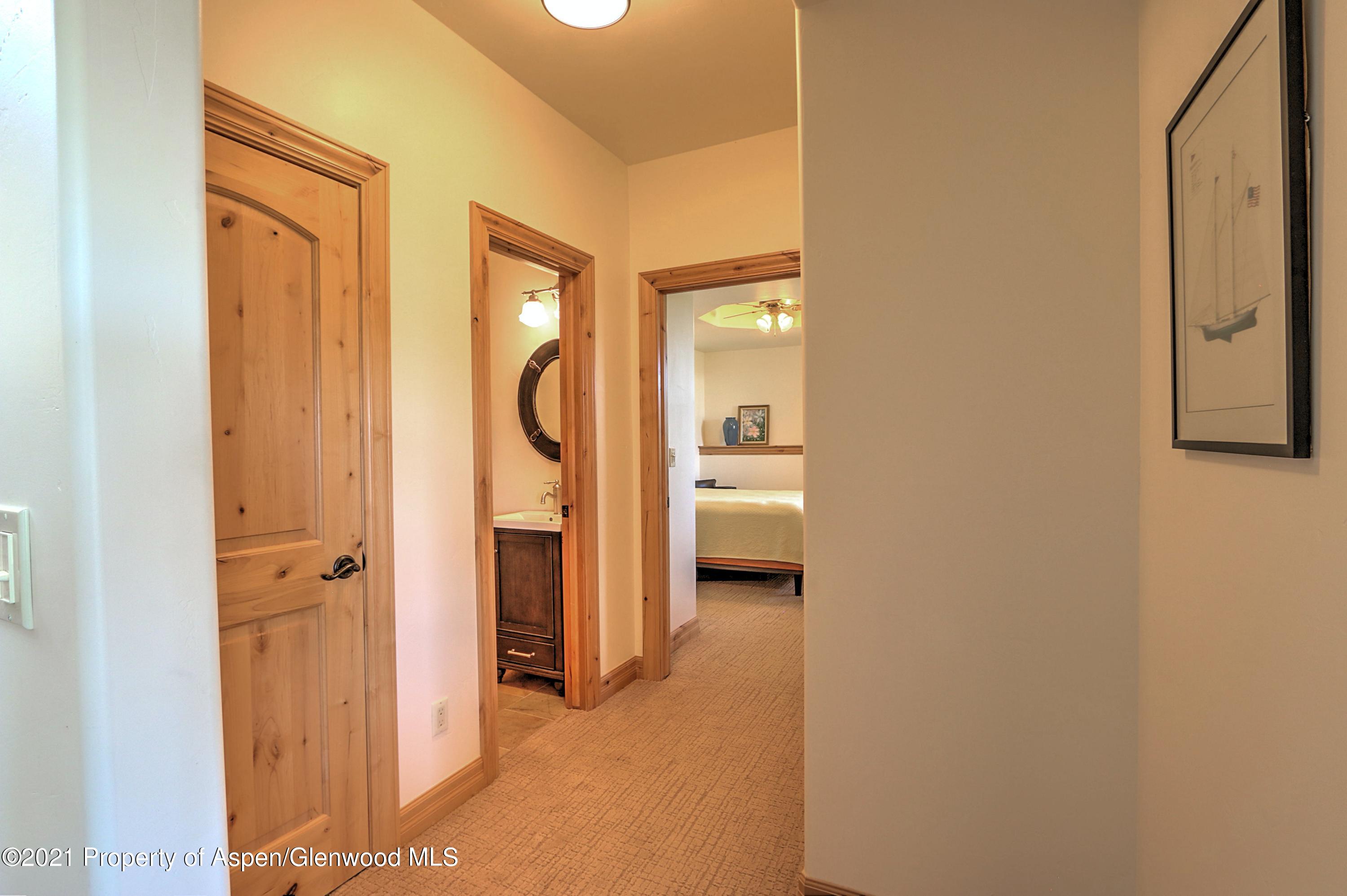 672 Cedar Hills Road Silt, CO 81652 - Photo 26 of 40 Lower level hallway