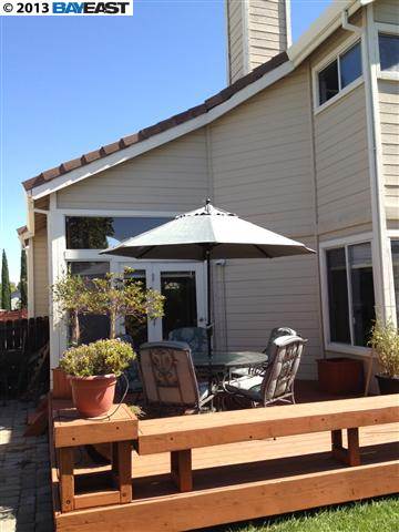 a front view of a house with patio