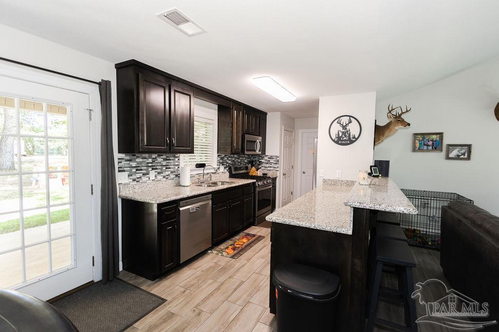 8233 Tidwell Road Pace, FL 32571 - Photo 8 of 30 Gallery Image 8