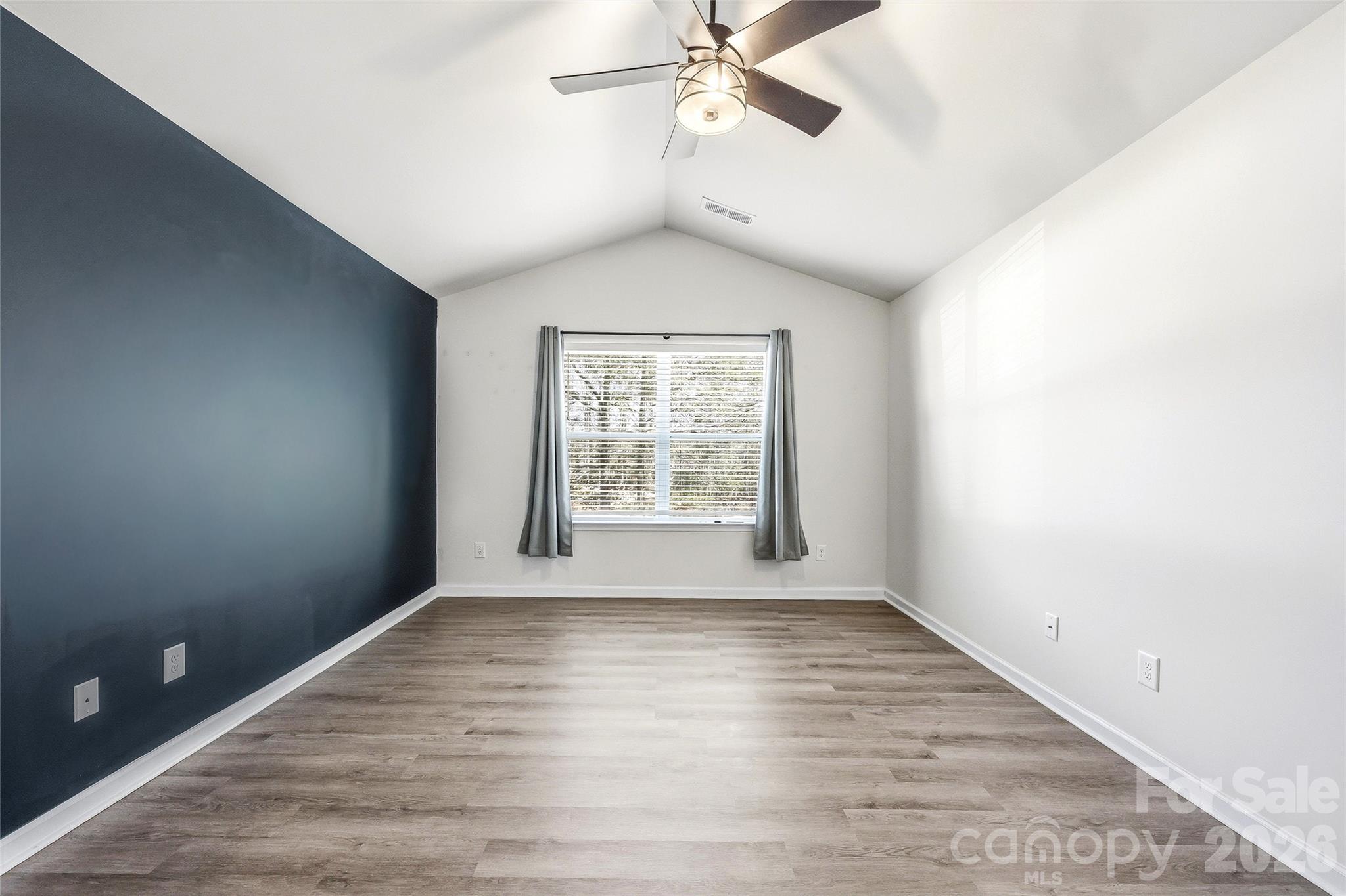 319 Oak Br Road Arden, NC 28704 - Photo 18 of 33 wooden floor in an empty room with a window