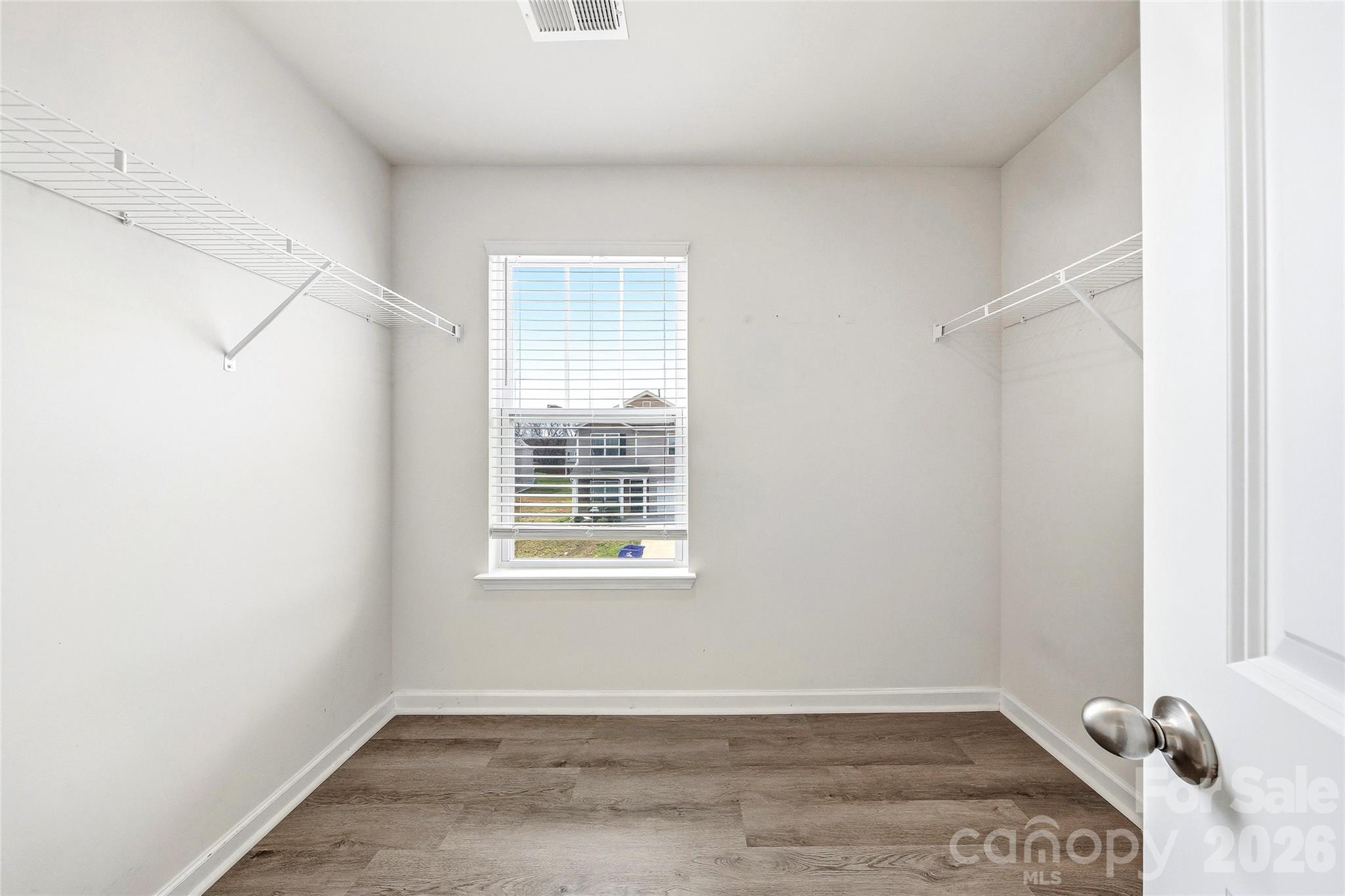 319 Oak Br Road Arden, NC 28704 - Photo 21 of 33 a view of a room with rack on the wall and a window