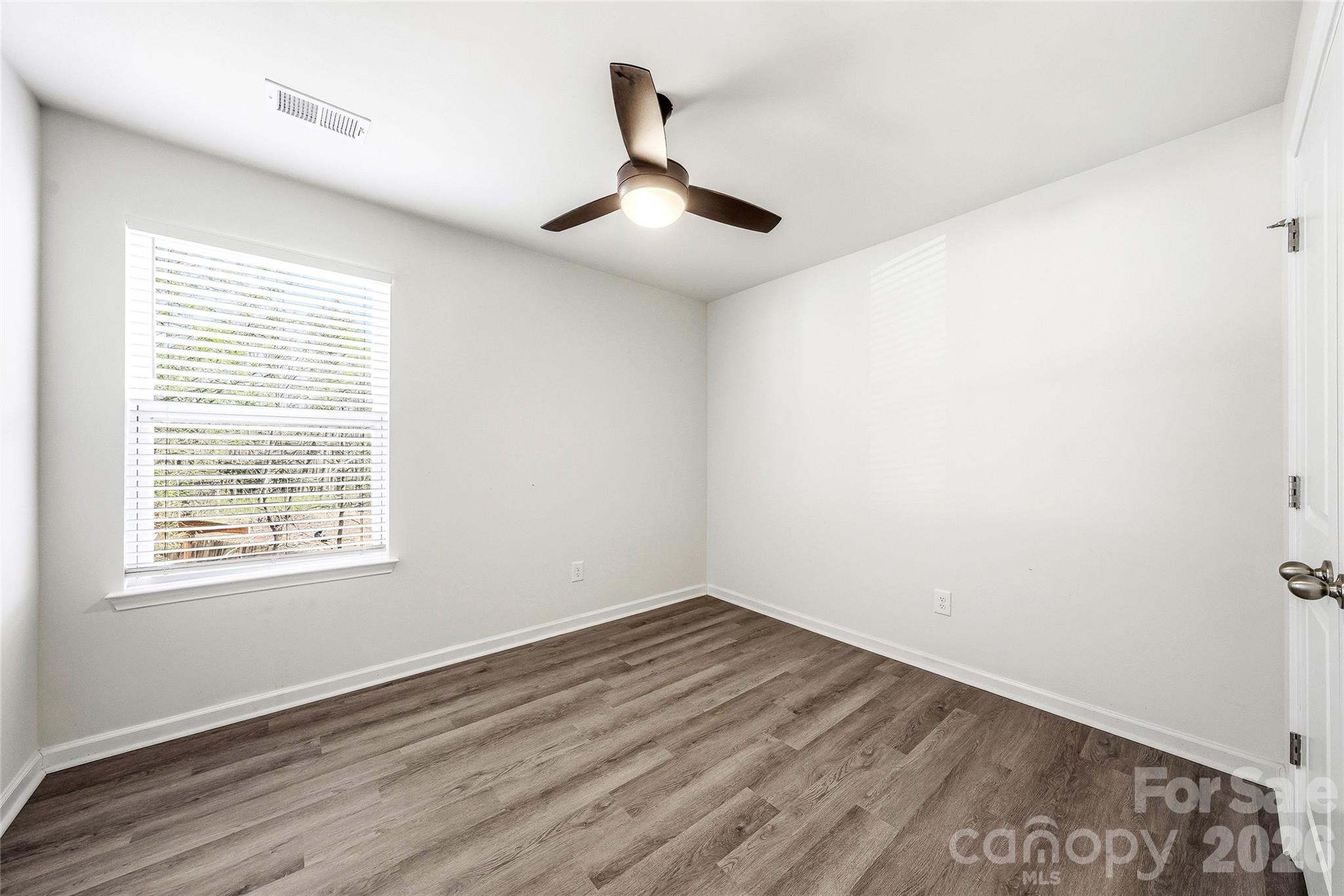 319 Oak Br Road Arden, NC 28704 - Photo 23 of 33 a view of empty room with wooden floor